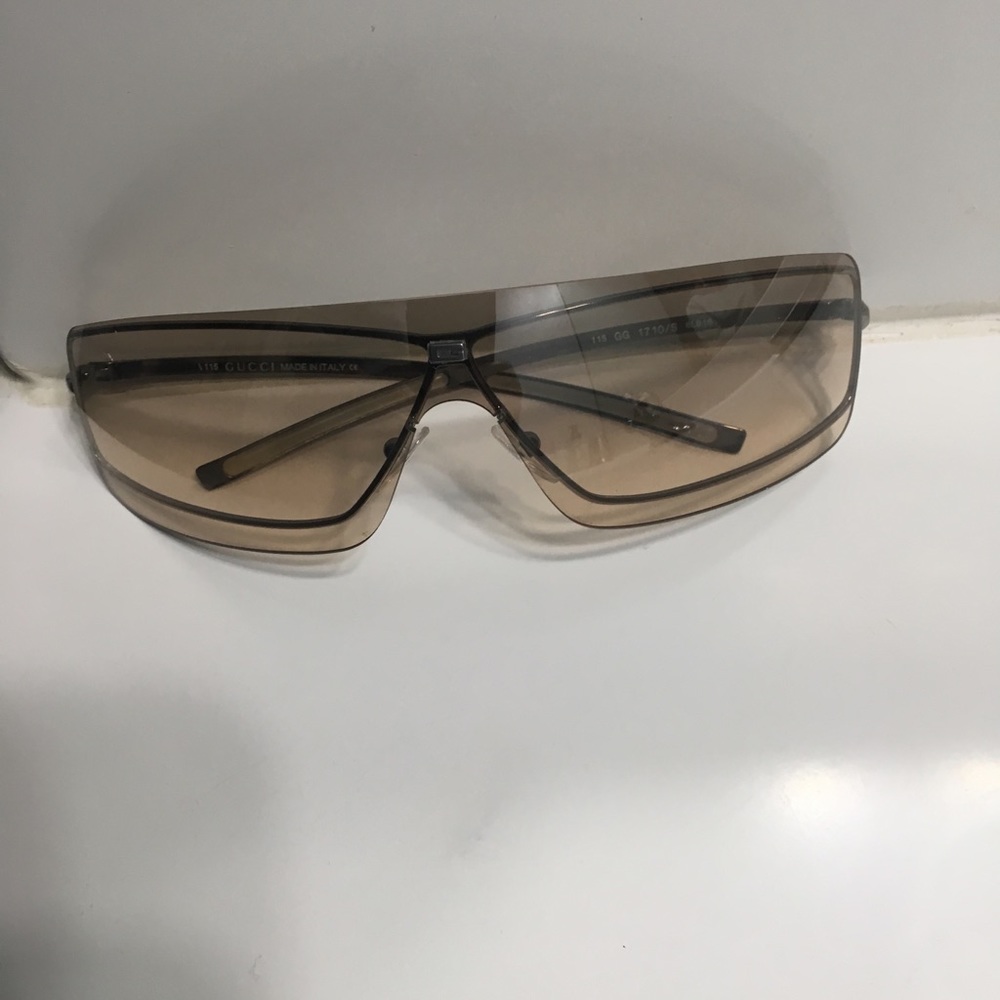 Gucci Sunglasses with Silver trim.
